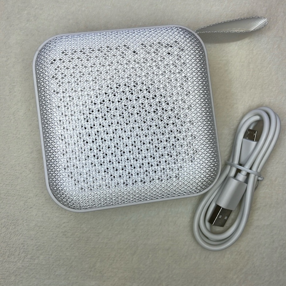 Sharper Image Speaker w Charging Cord. Used twice. Perfect condition
